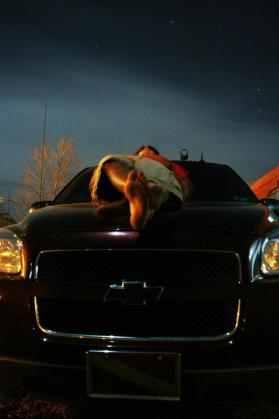 Laying on my hood under the stars